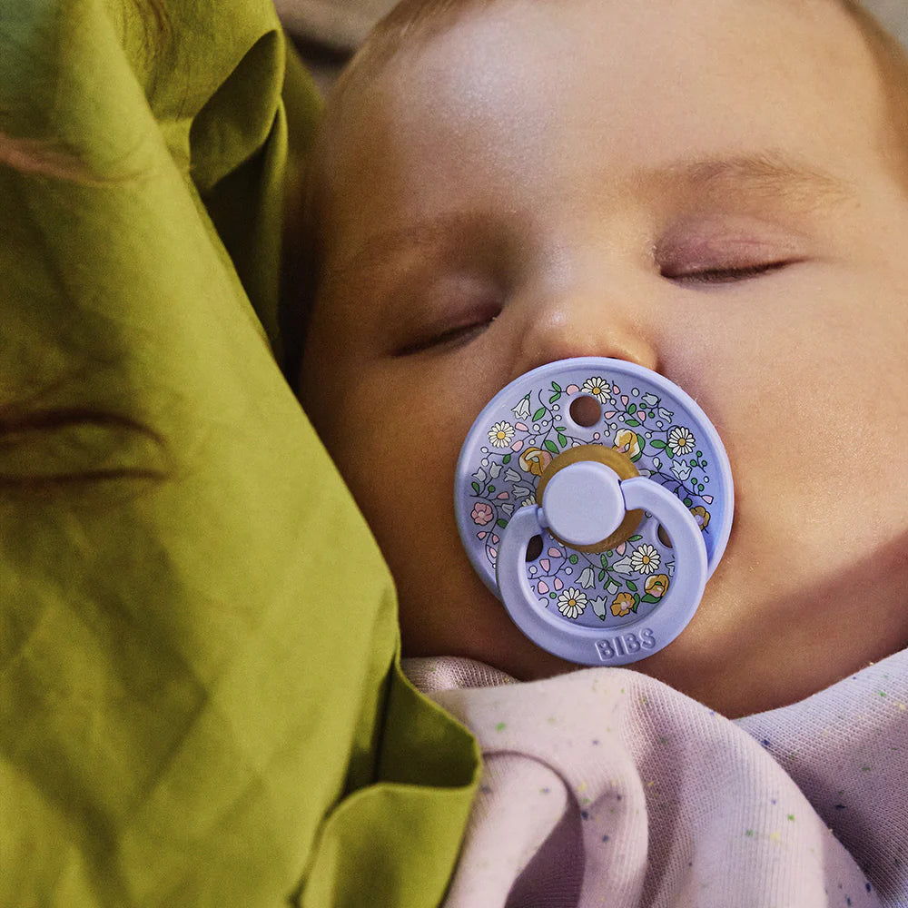 Gnash BIBS x LIBERTY Chloe Meadow ivory-colored accessories pack featuring soft, patterned fabric and classic design.