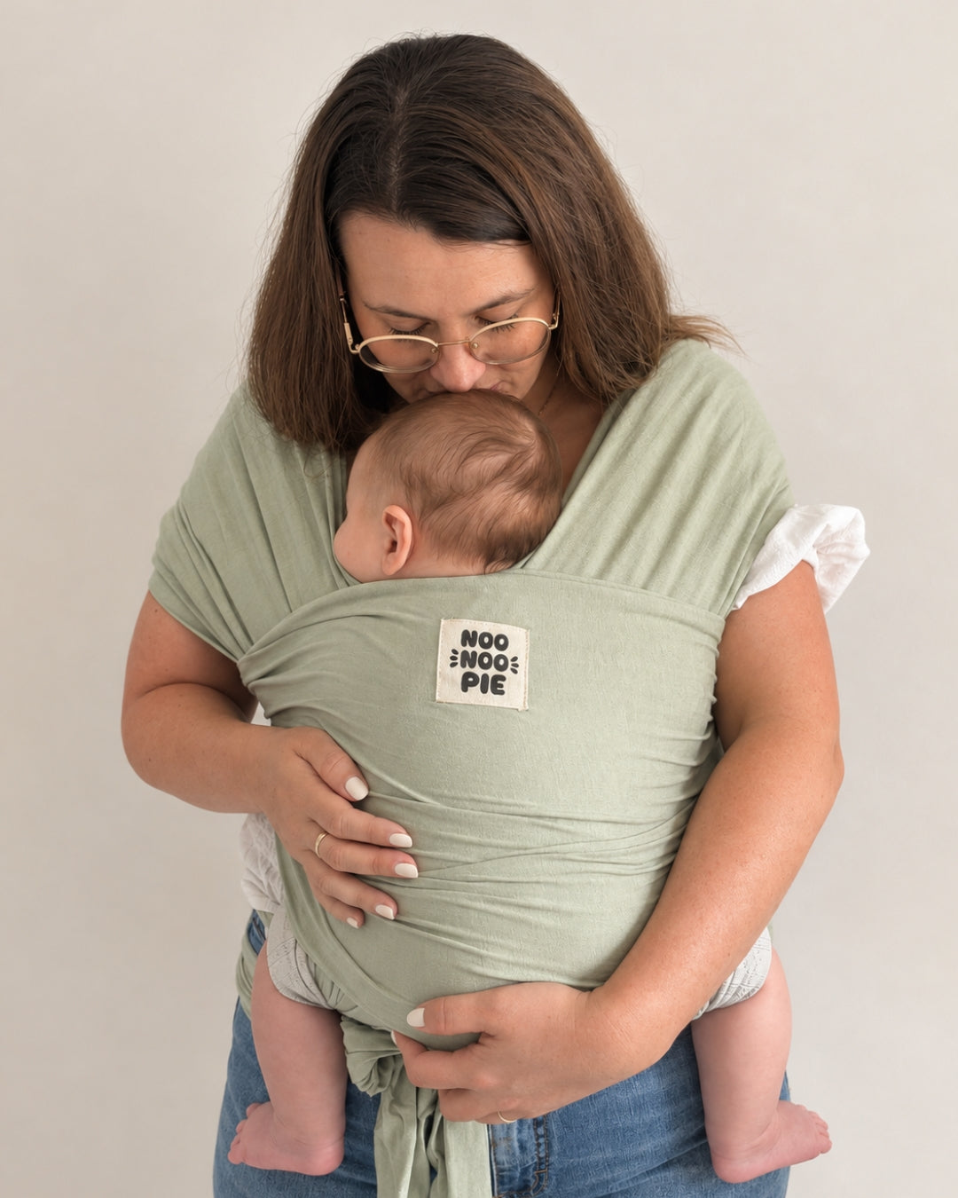 NooNoo Pie Tie baby wrap carrier in Sage worn with baby
