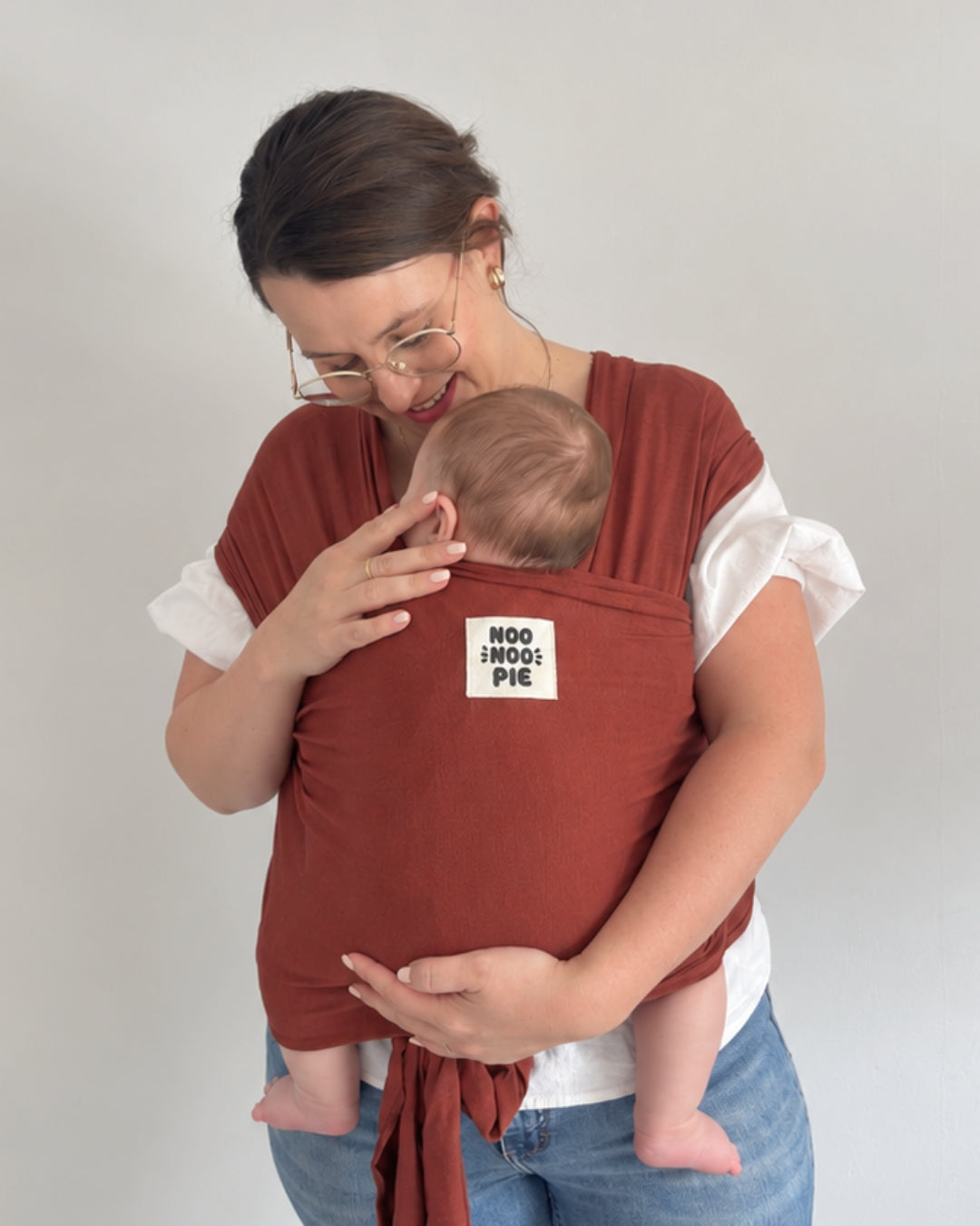 NooNoo Pie Tie baby wrap carrier in Sienna worn with baby
