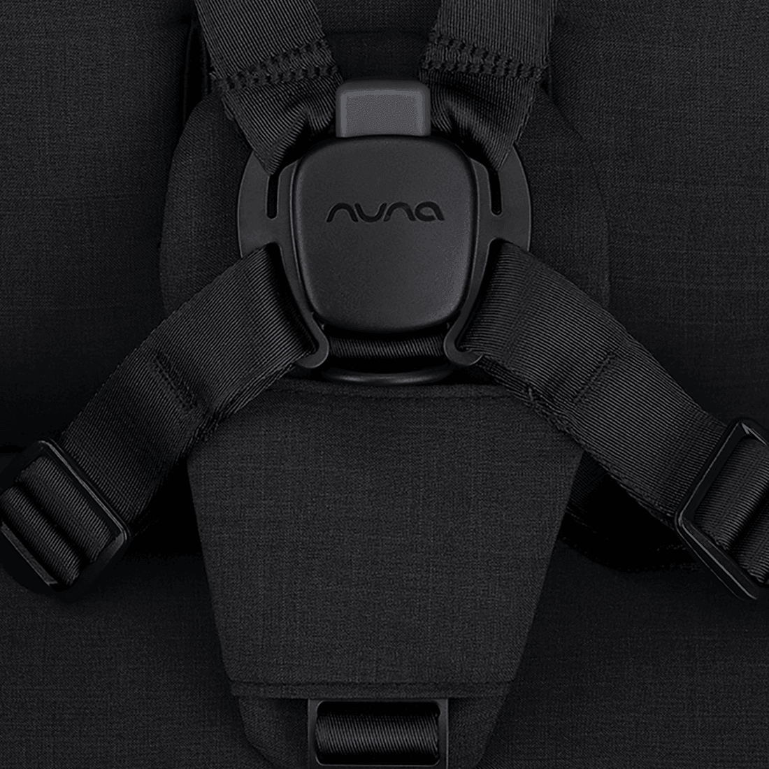 Nuna VIAA cabn Cabin Stroller in Caviar, close-up of safety buckle detail