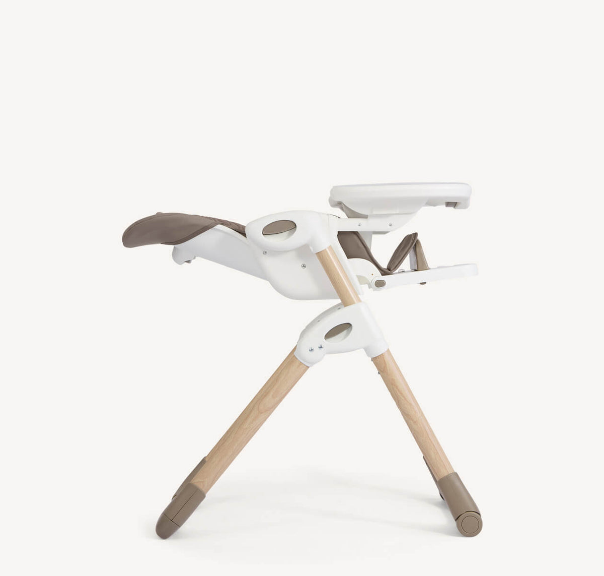 Joie Mimzy Recline high chair in Strata Acorn Wood, showing a side profile in a reclined position with wooden finish.