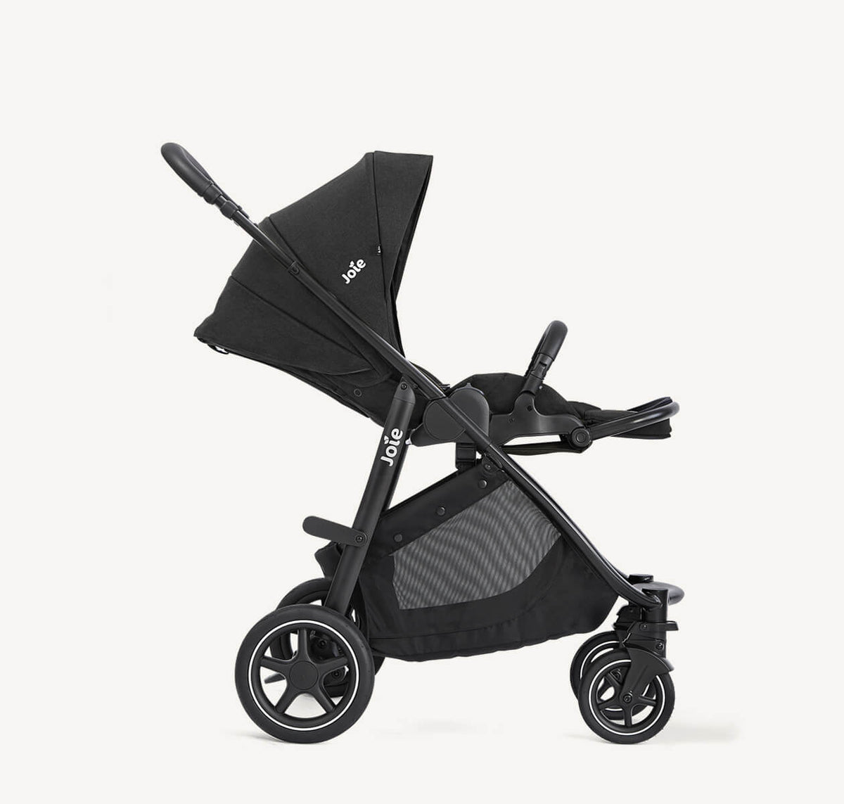 Joie Versatrax travel system with i-Gemm 3 in Raven, right profile view showing stroller with reclining seat and travel accessories.