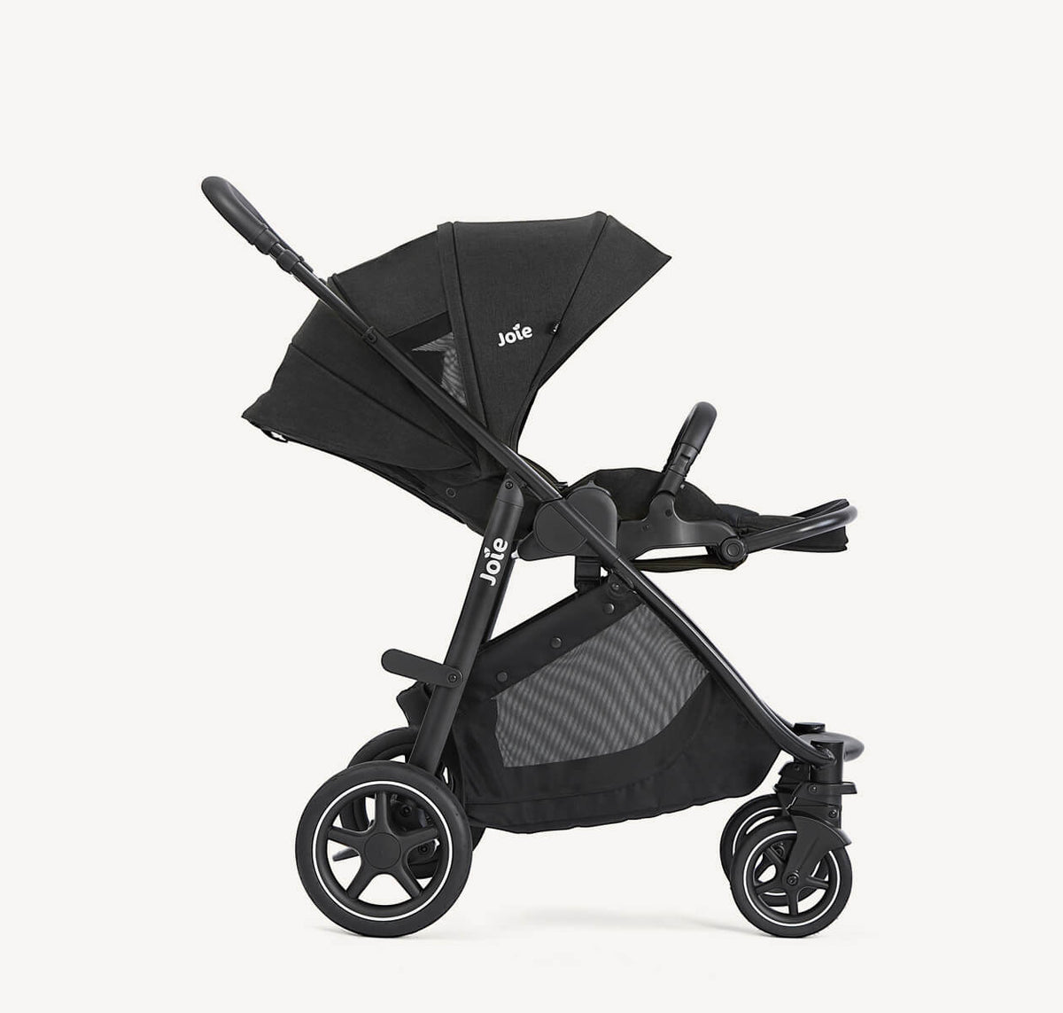 Joie Versatrax travel system with i-Gemm 3 infant car seat, right profile view, reclined position, with canopy in Raven color.