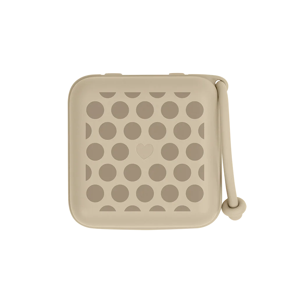 BIBS Studio Pacifier Box in Polka Vanilla / Dark Oak, a compact case for storing and sterilizing pacifiers.