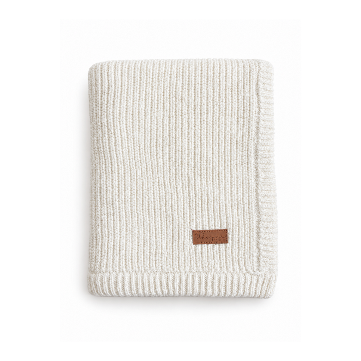 White Bubbadue Whisper Weighted Knitted Blanket draped over a bed, showing its soft, cozy texture and thick knit pattern.