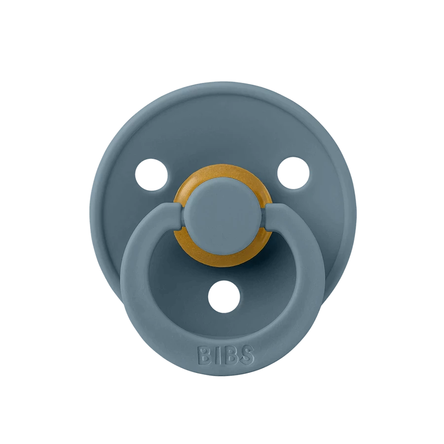BIBS Colour - Various Colours Our Colour pacifier is the original BIBS pacifier and has been on the market for over 40 years. It has the signature round BIBS shield with three vent holes and round BIBS engraved handle ring. The nipple is round and resembles the shape and size of the mother's breast to provide comfort to your baby. Available in natural rubber latex. Recommended by midwives to support natural breastfeeding. The shield is made of 100% food-safe material. Completely free from BPA, PVC, and phth