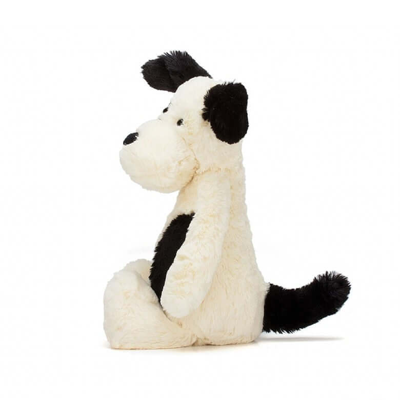 Bashful Black & Cream Puppy (18cm) - Jellycat This little patch pup is doggone irresistible. Silky-soft and lovingly loyal, Bashful Black & Cream Puppy wants to play all day! His smudgy black patch and sooty tail make him even more adorable! Size Small | 18cm SAFETY & CARE Tested to and passes the European Safety Standard for toys: EN71 parts 1, 2 & 3, for all ages. Suitable from birth. Hand wash only; do not tumble dry, dry clean or iron. Not recommended to clean in a washing machine. Check all labels upon
