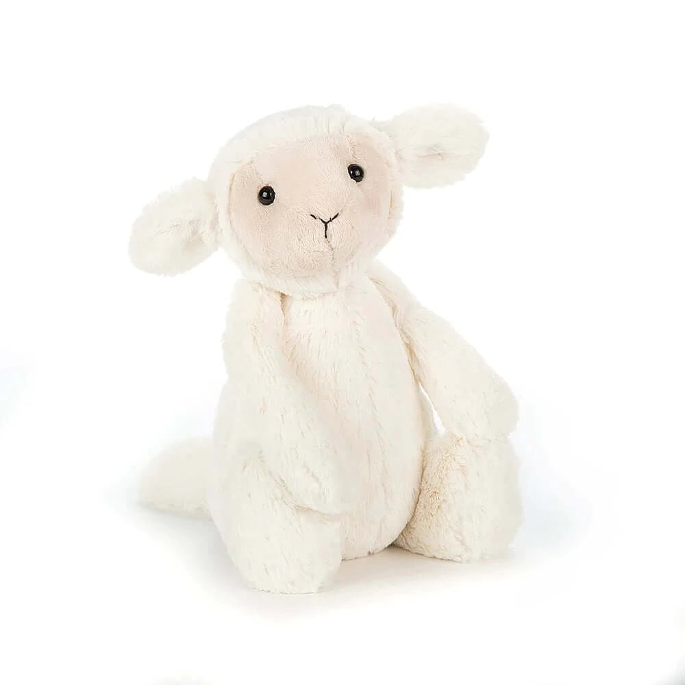 Bashful Lamb (18cm) - Jellycat This fleecy little lamb is three bags full of cuteness! Tumbly-bumbly, creamy and cuddly, Bashful Lamb has gotten all dizzy! Her dreamily soft buttercream fur and flopsy ears are irresistibly scrummy - no wonder she’s such a loveable baby! Size Small | 18cm Safety & Care Tested to and passes the European Safety Standard for toys: EN71 parts 1, 2 & 3, for all ages. Suitable from birth. Hand wash only; do not tumble dry, dry clean or iron. Not recommended to clean in a washing m