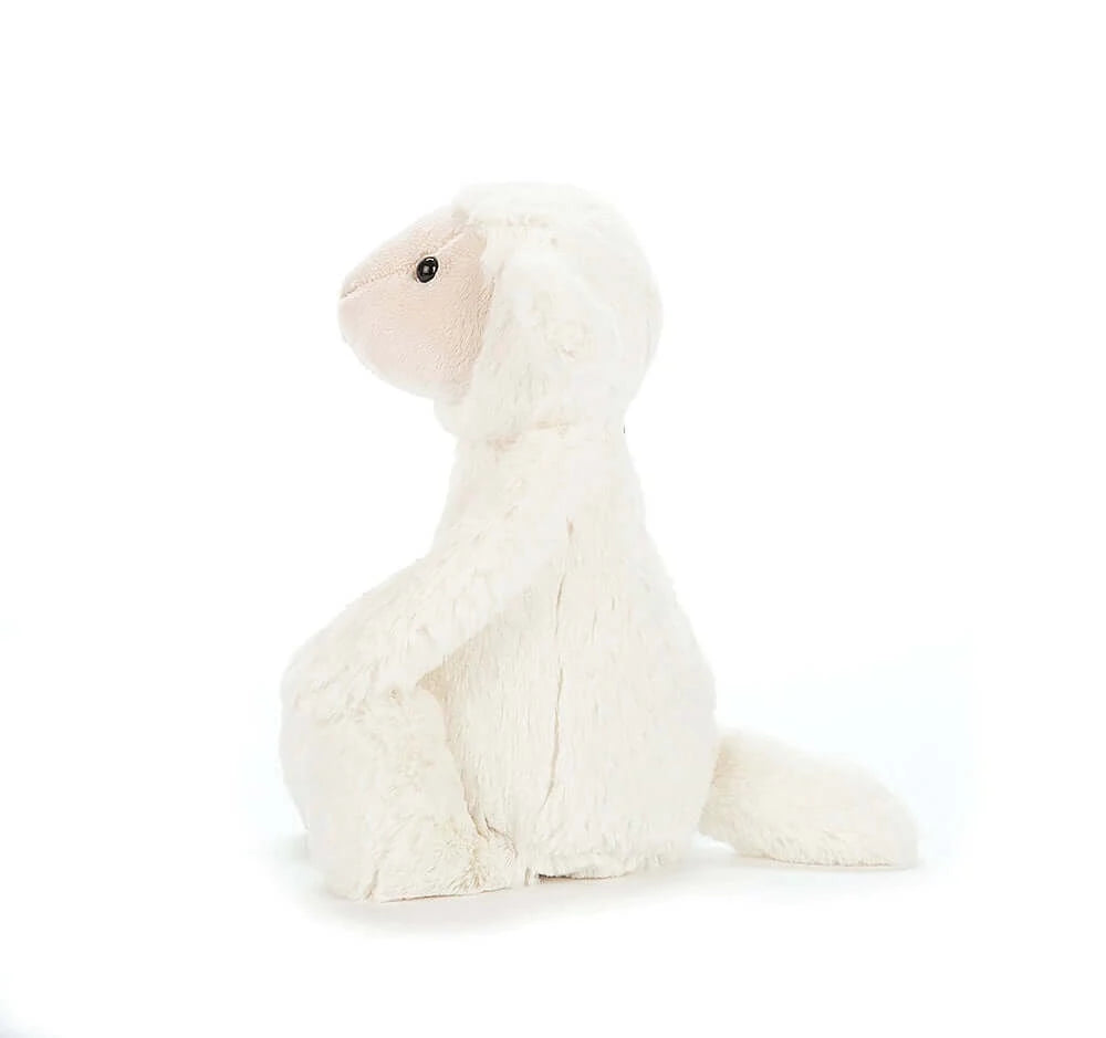 Bashful Lamb (18cm) - Jellycat This fleecy little lamb is three bags full of cuteness! Tumbly-bumbly, creamy and cuddly, Bashful Lamb has gotten all dizzy! Her dreamily soft buttercream fur and flopsy ears are irresistibly scrummy - no wonder she’s such a loveable baby! Size Small | 18cm Safety & Care Tested to and passes the European Safety Standard for toys: EN71 parts 1, 2 & 3, for all ages. Suitable from birth. Hand wash only; do not tumble dry, dry clean or iron. Not recommended to clean in a washing m