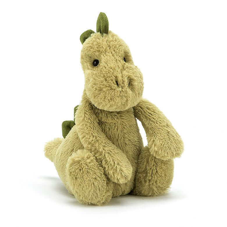 If I Were A Dinosaur Book & Bashful Dino - Jellycat Bashful Dino loves to read, and now the little ones can read along with him! Snuggle up to this sweet Jurassic friend and explore this fun and adventurous story. Size Small | 18cm SAFETY & CARE Tested to and passes the European Safety Standard for toys: EN71 parts 1, 2 & 3, for all ages. Suitable from birth. Book made from 100% paper board. Wipe clean only. Toy hand wash only; do not tumble dry, dry clean or iron. Not recommended to clean in a washing mach