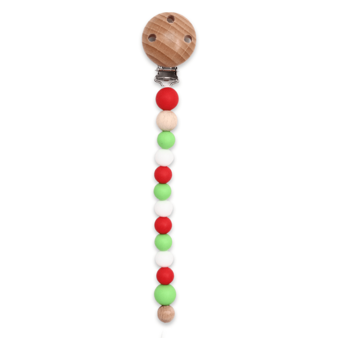 Christmas Dummy Chain Here's to no more dropped and dirty dummies! Our Classic Dummy Clips feature beautiful natural beechwood or non toxic silicone beads, or a combination of the two. Silicone beads are BPA, Phthalate, lead and Cadium free and all wood beads are raw/untreated. Christmas Dummy Chain Here's to no more dropped and dirty dummies! Our Classic Dummy Clips feature beautiful natural beechwood or non toxic silicone beads, or a combination of the two. Silicone beads are BPA, Phthalate, lead and Cadi